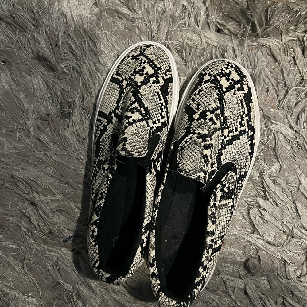 Snake print slip ons